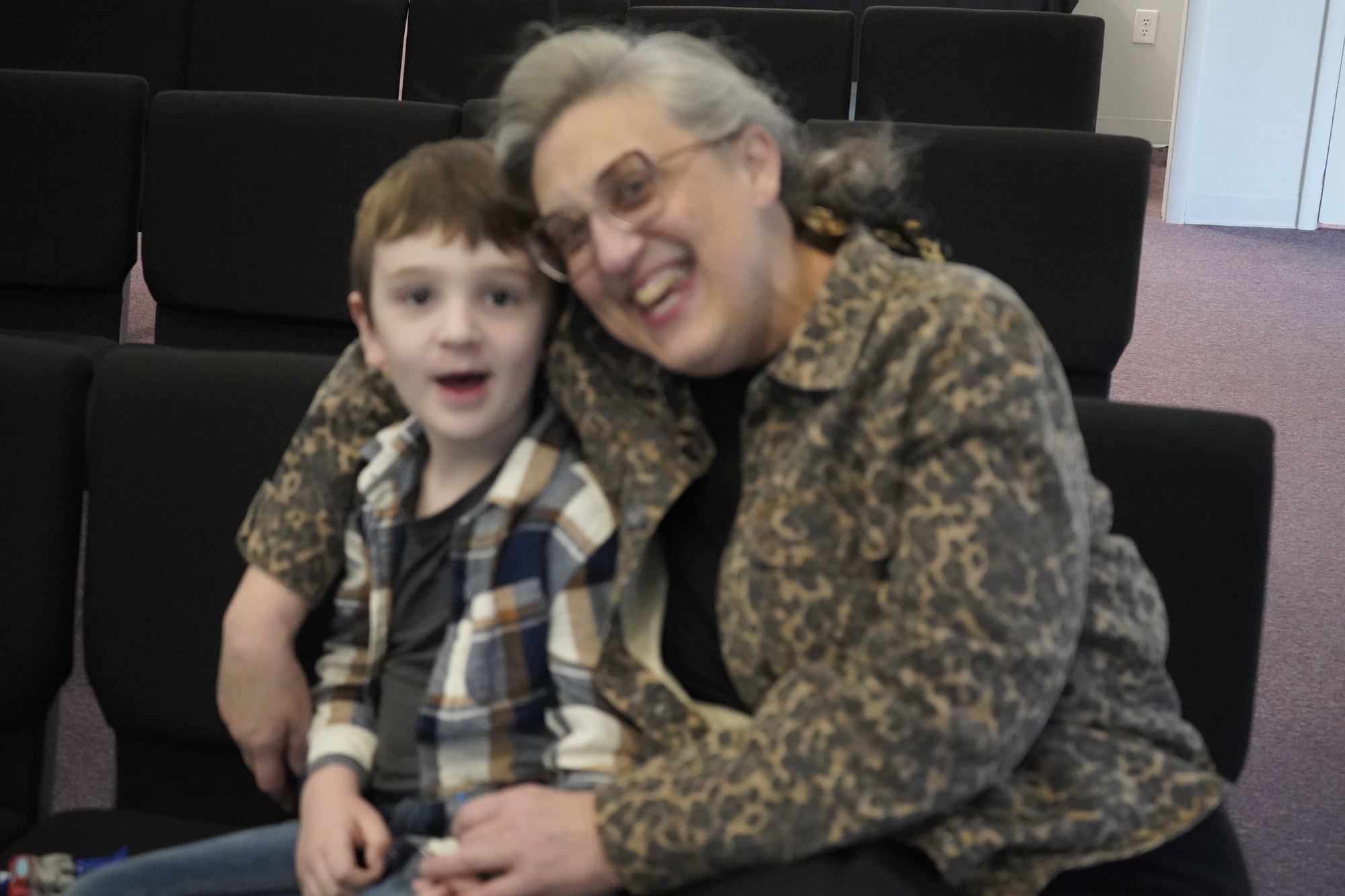 Lesa Whitehead sharing a joyful moment with a child at Refuge Church